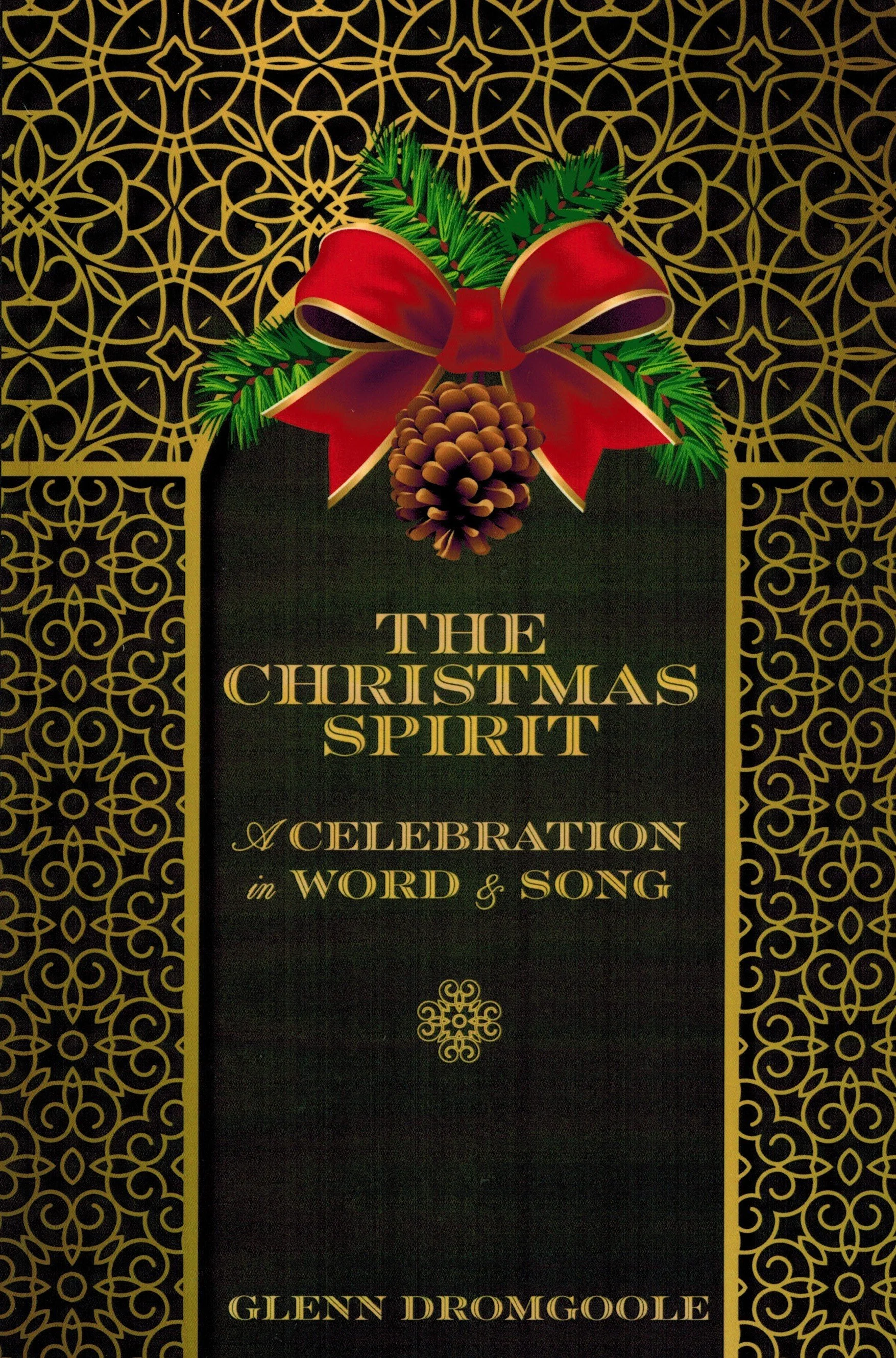 Book cover with a black background, gold decorative patterns on the sides, a red bow with green pine branches and pinecone at the top, and gold text that reads 'The Christmas Spirit: A Celebration in Word & Song' by Glenn Dromgoole.