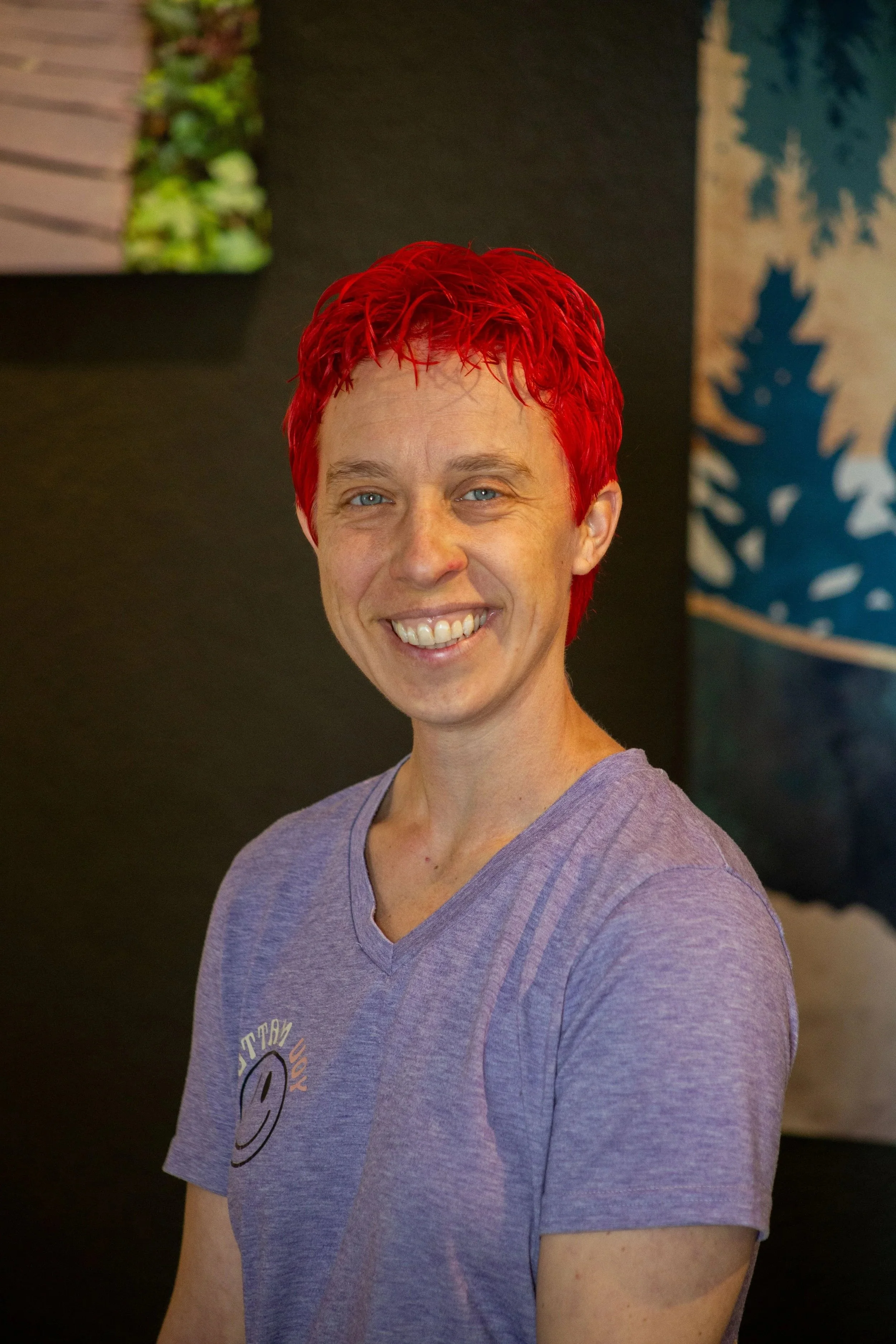 headshot of Julie Rattelmeuller: owner and massage therapist at Ember & Flow bodywork  and massage therapy studio in South Denver
