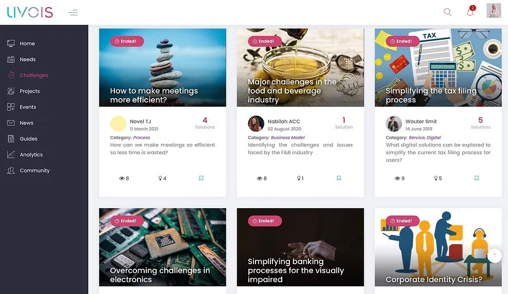 A web page showing various challenges with their titles, authors, categories, and solutions, marked as ended, including topics like making meetings more efficient, challenges in food and beverage industry, simplifying tax filing, electronics, banking for the visually impaired, and corporate identity crisis.