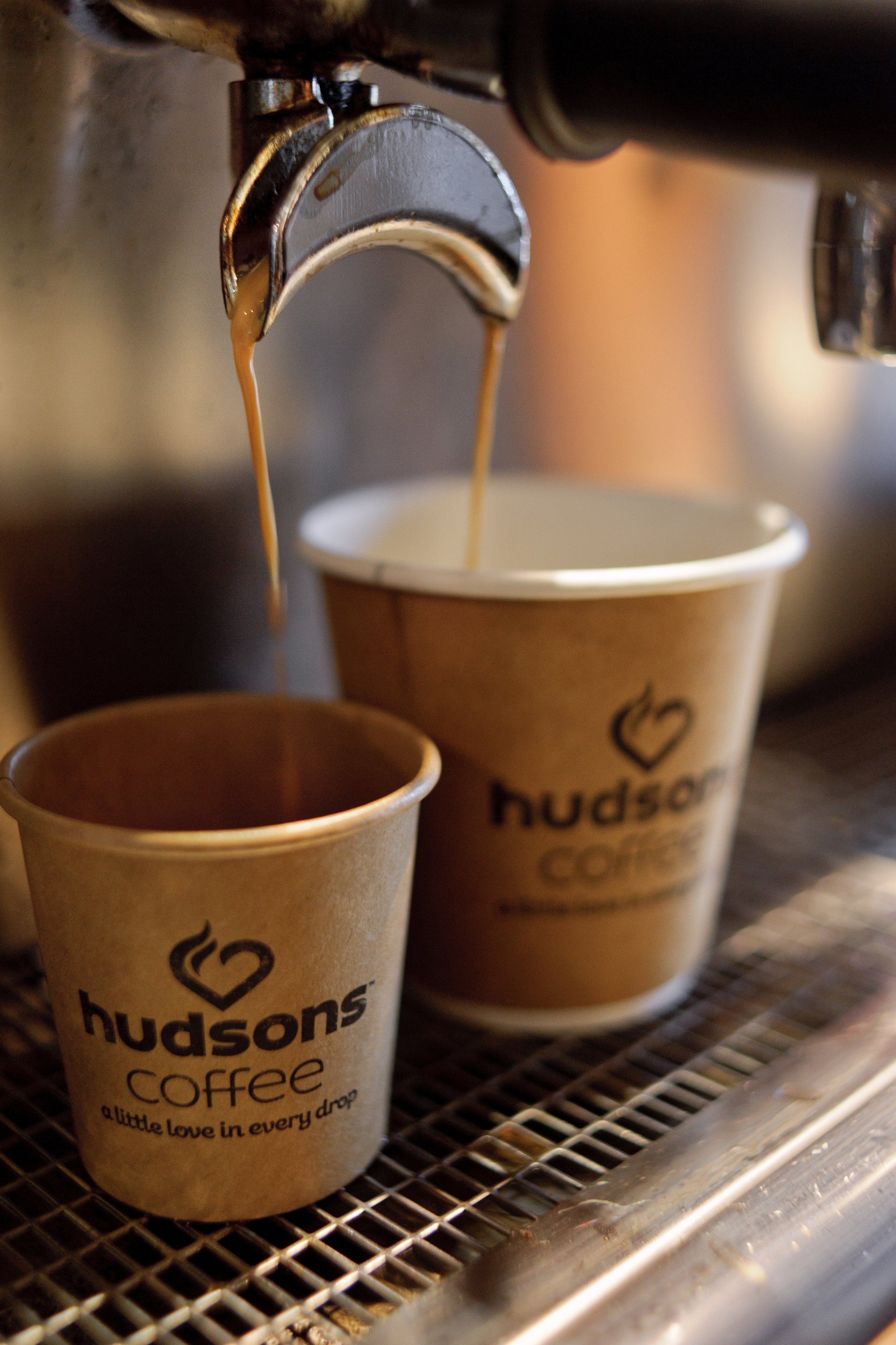 Printed cups for Hudsons Coffee — a branding project by Domenic Minieri.
