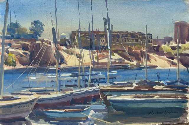 Watercolor painting of sailboats docked at a marina with buildings and trees in the background.
