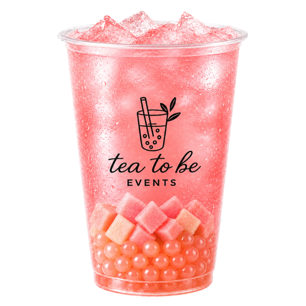 A clear plastic cup filled with pink-colored iced beverage, topped with ice cubes, containing small pink and white balls and pink and white cubed jelly or fruit pieces at the bottom. The cup features a black logo with a bubble tea drink illustration, the text "tea to be" and "EVENTS" underneath.