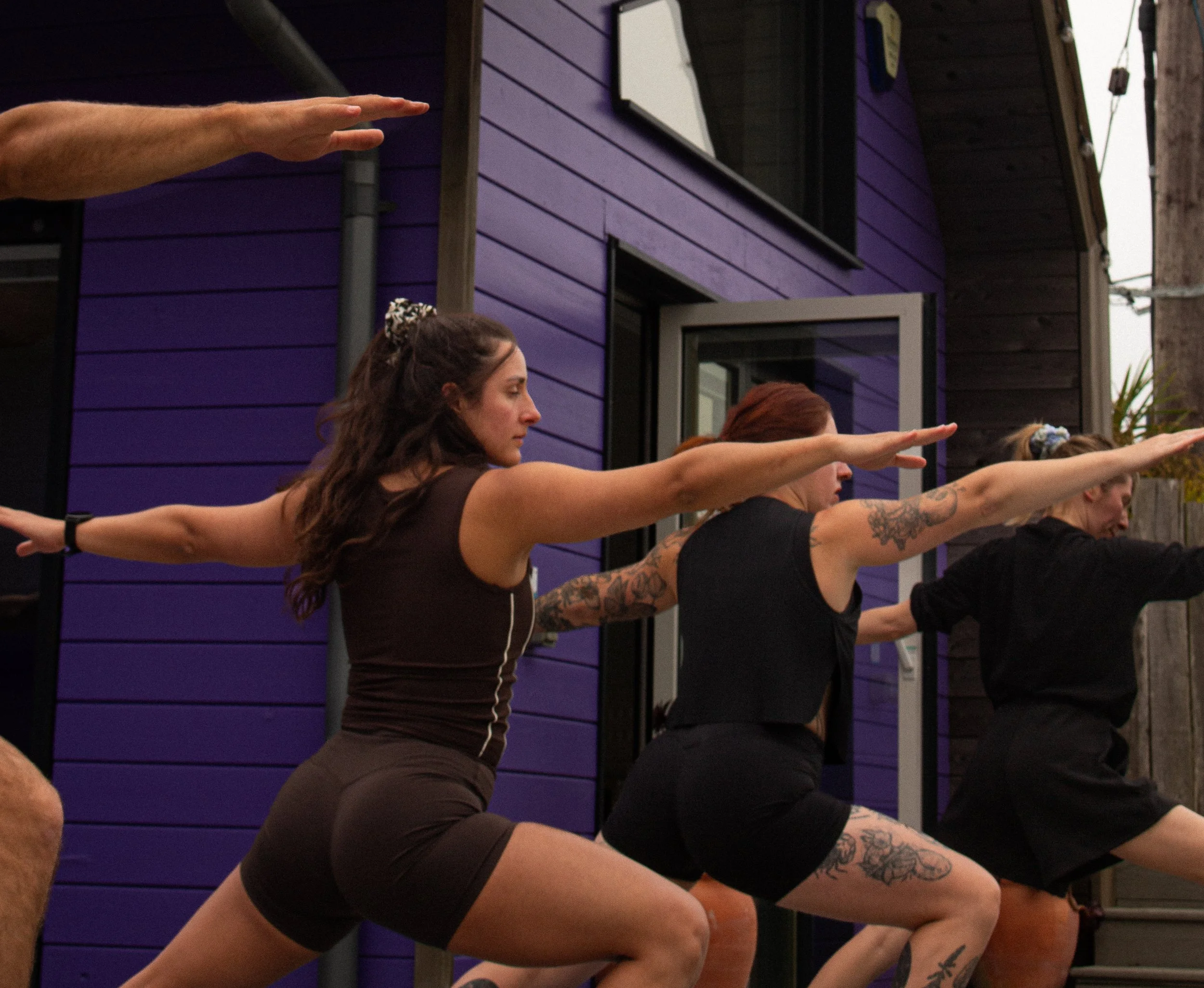 Guests in an outdoor yoga-based stretching session at the retreat.