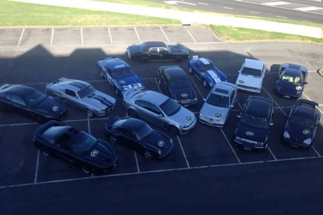 Sports cars and supercars parked together at a Cannonball Run Australia meet