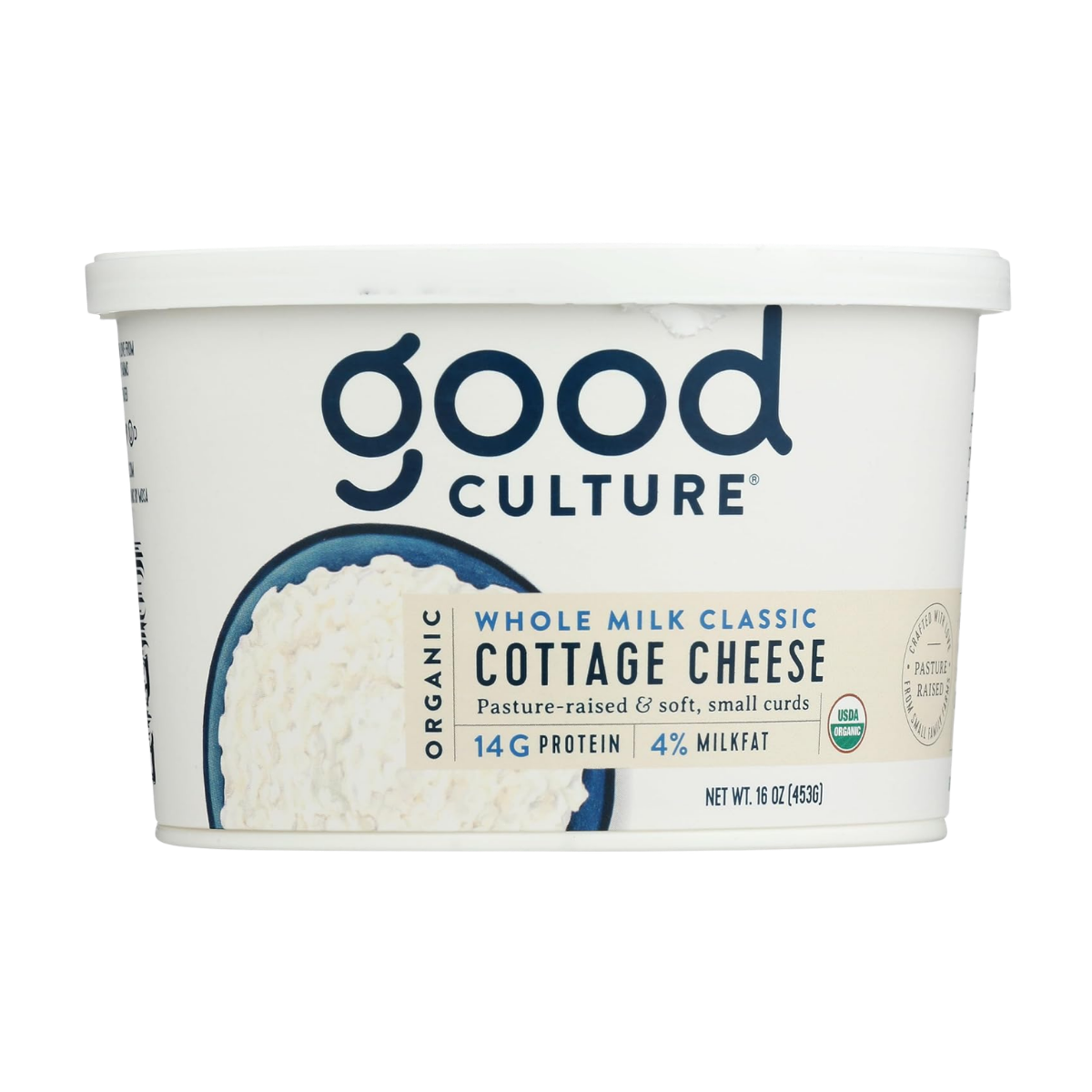 Container of good culture organic whole milk classic cottage cheese with a label indicating 14 grams of protein, 4% milkfat, and that it is pasture-raised with small curds.