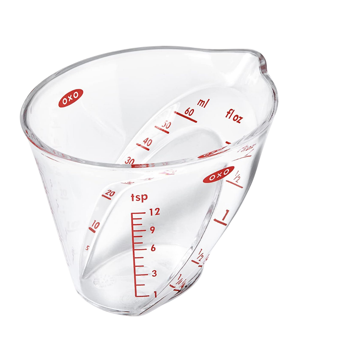 Clear plastic measuring cup with red markings for teaspoons, tablespoons, milliliters, and fluid ounces, viewed from a high angle.