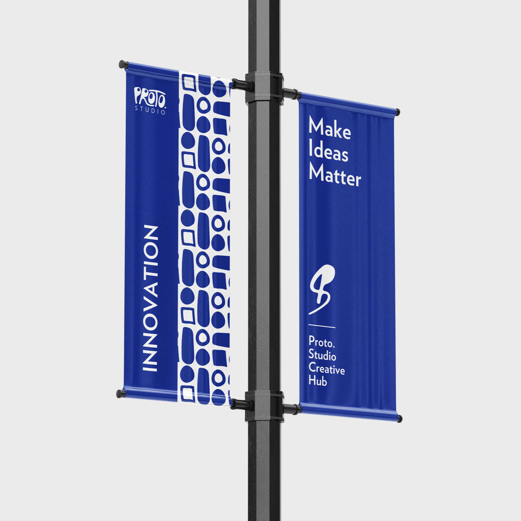 Two vertical blue banners attached to a black pole, one with white text and a graphic pattern and the other with white text that reads: "Make Ideas Matter".