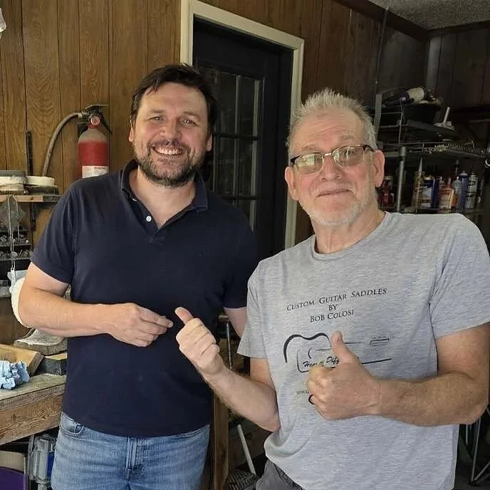 David Norcross and Bob Colosi, thumbs up of approval after Bob's retirement.