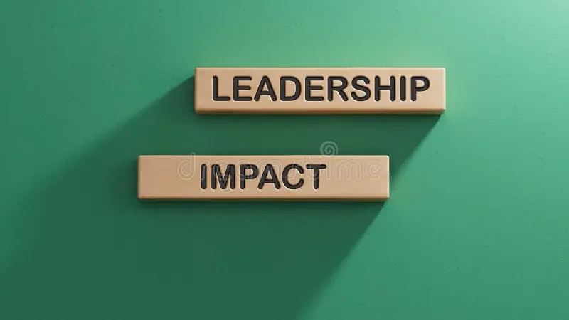 Wooden tiles with the words "Leadership" and "Impact" on a green background.