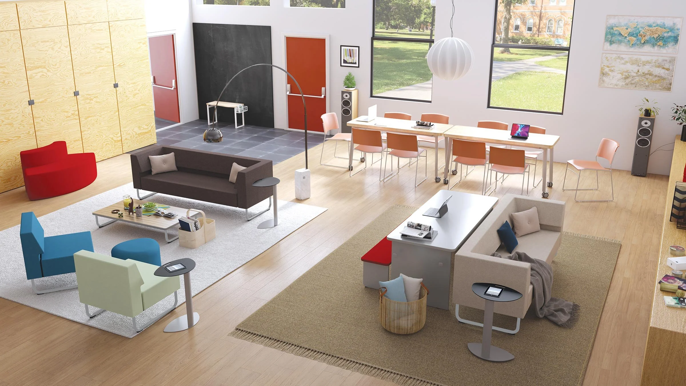 Indiana School Projects Plus (ISP+) in Indiana serves community spaces: An open-concept modern office with multiple seating areas, a large meeting table with chairs, a low coffee table, and artwork on the walls, with large windows.