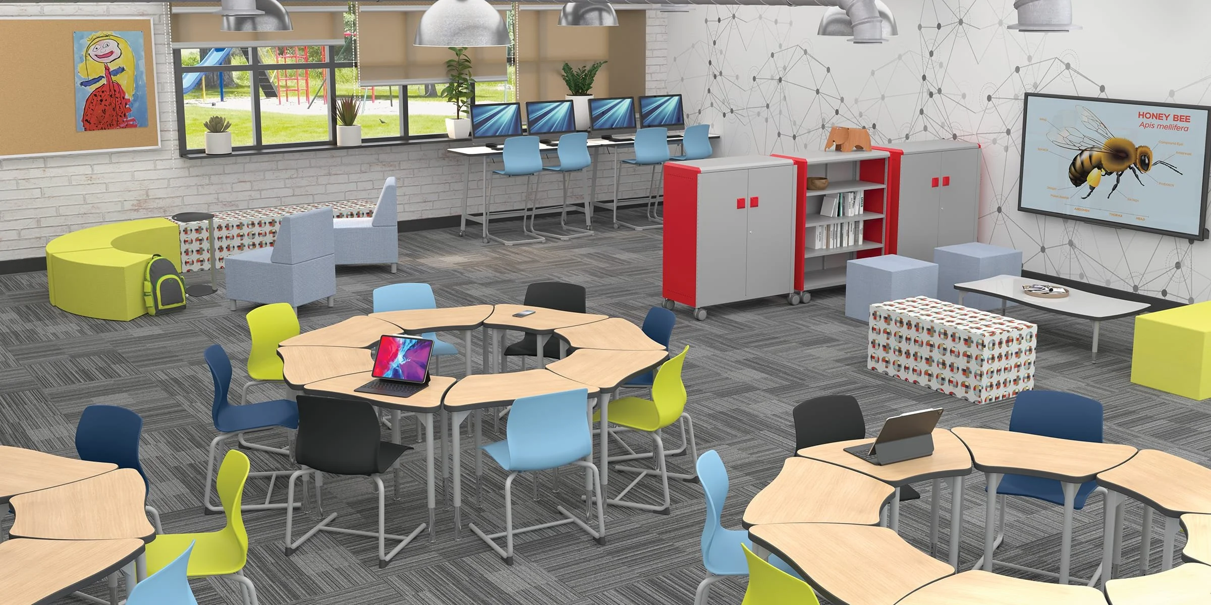 Indiana School Projects Plus (ISP+) in Indiana serves K-12 classrooms: Modern classroom with desks, chairs, computers, tablets, books, and educational displays including a large screen showing a honey bee diagram, and colorful seating areas.