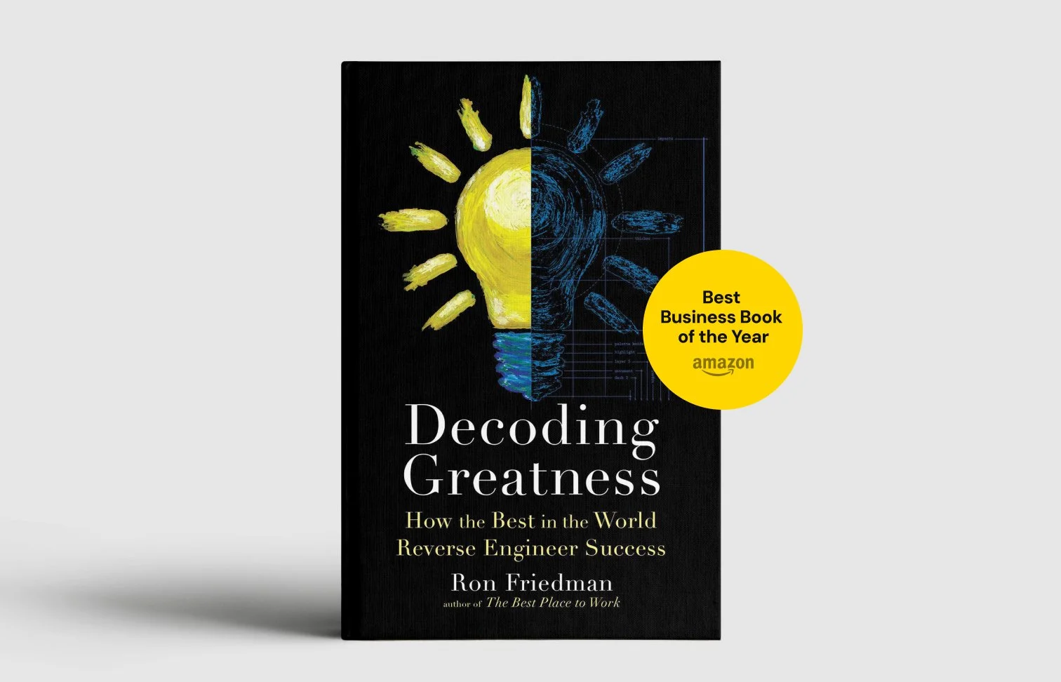 Cover of Decoding Greatness by Ron Friedman with a sticker that says "Best Business Book of the Year" by Amazon