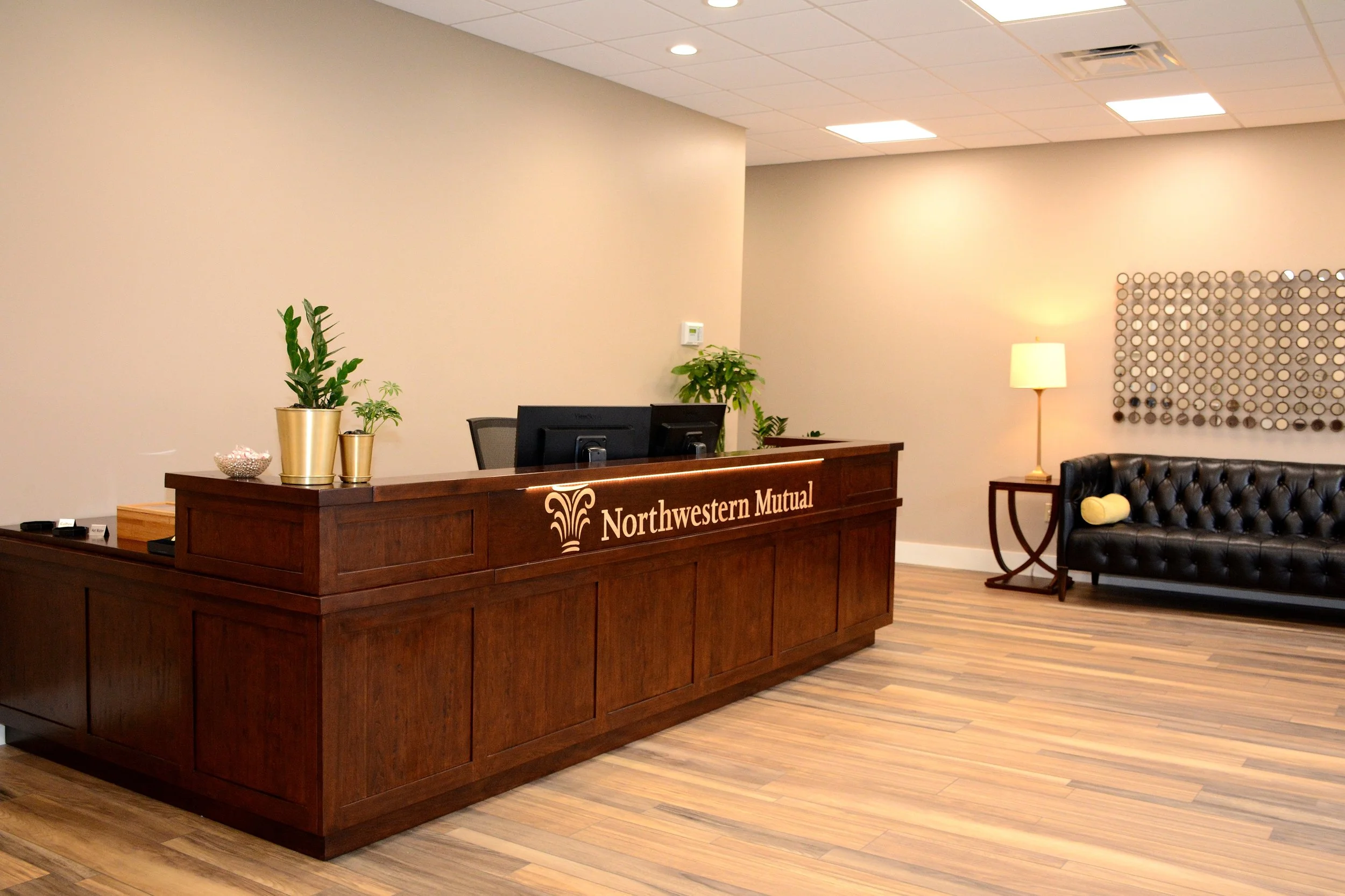 Reception and client seating area at the Northwestern Mutual office completed by MIRC Construction Services.
