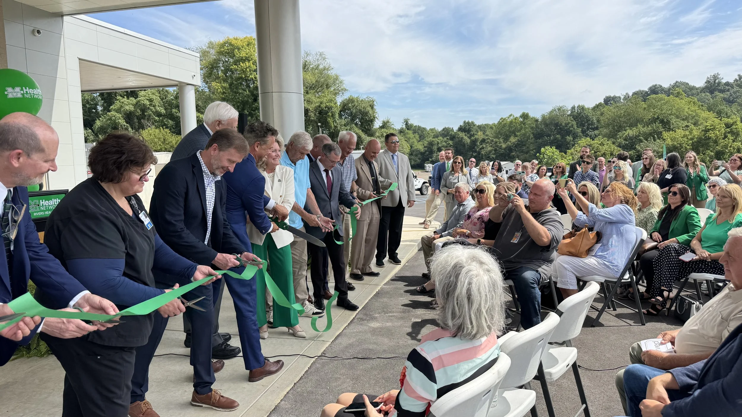 Ribbon-cutting ceremony celebrating the completion of a healthcare construction project in West Virginia.