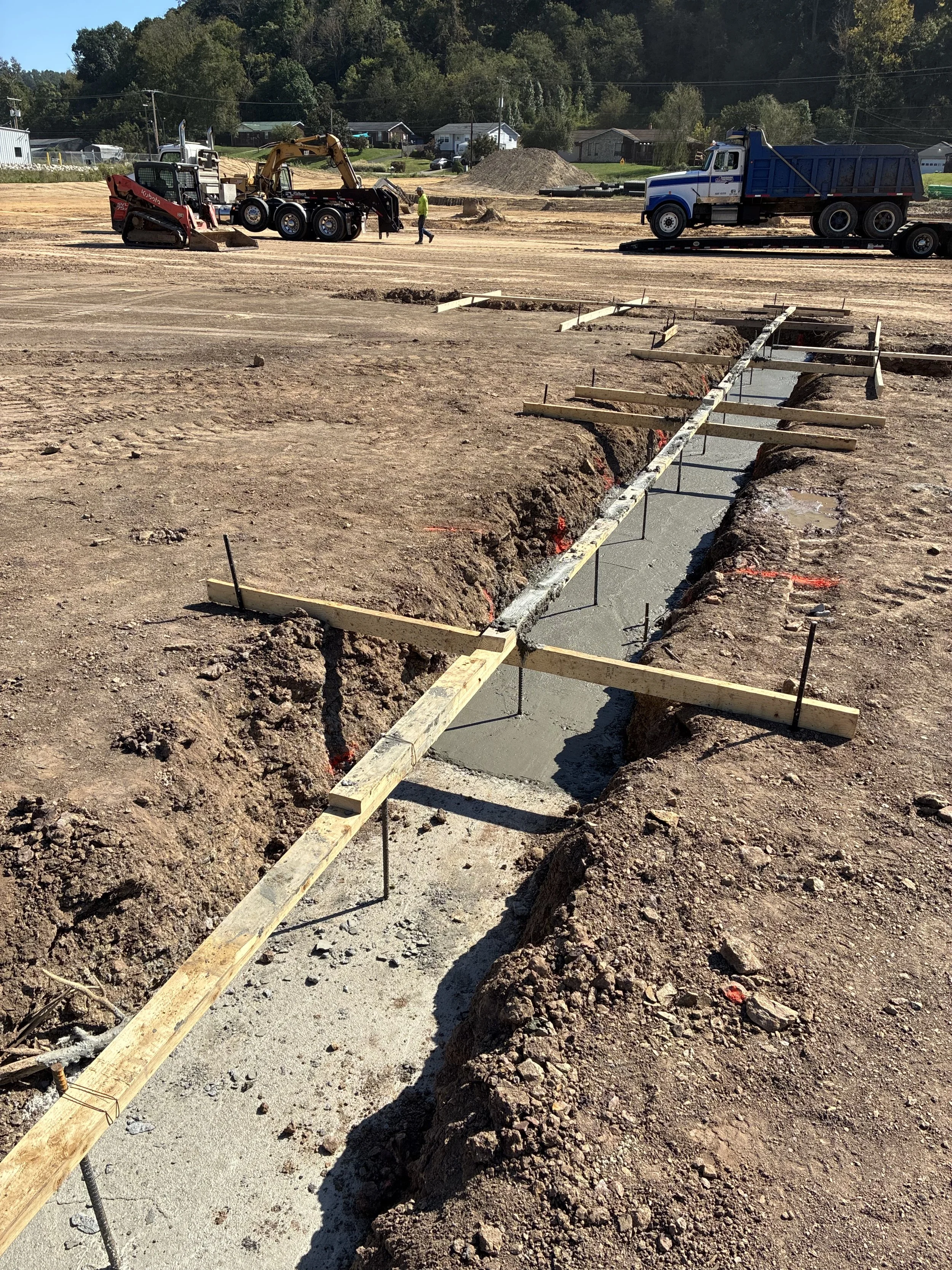 Concrete foundation and footing work underway at a MIRC construction project