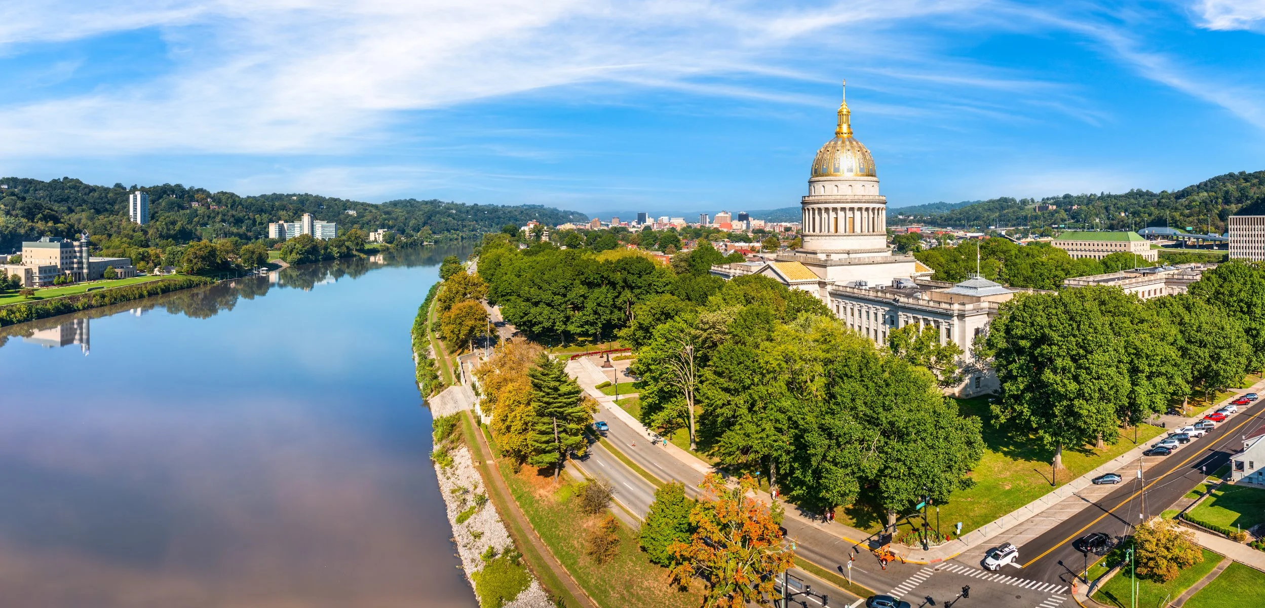 West Virginia State Capitol and Charleston skyline along the Kanawha River