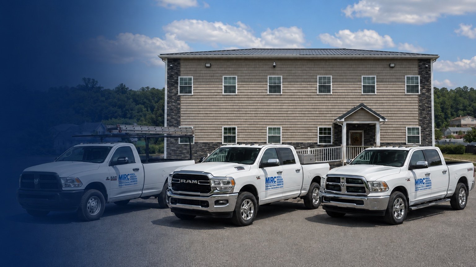 Three branded MIRC work trucks parked outside the company’s headquarters in Hurricane, West Virginia.