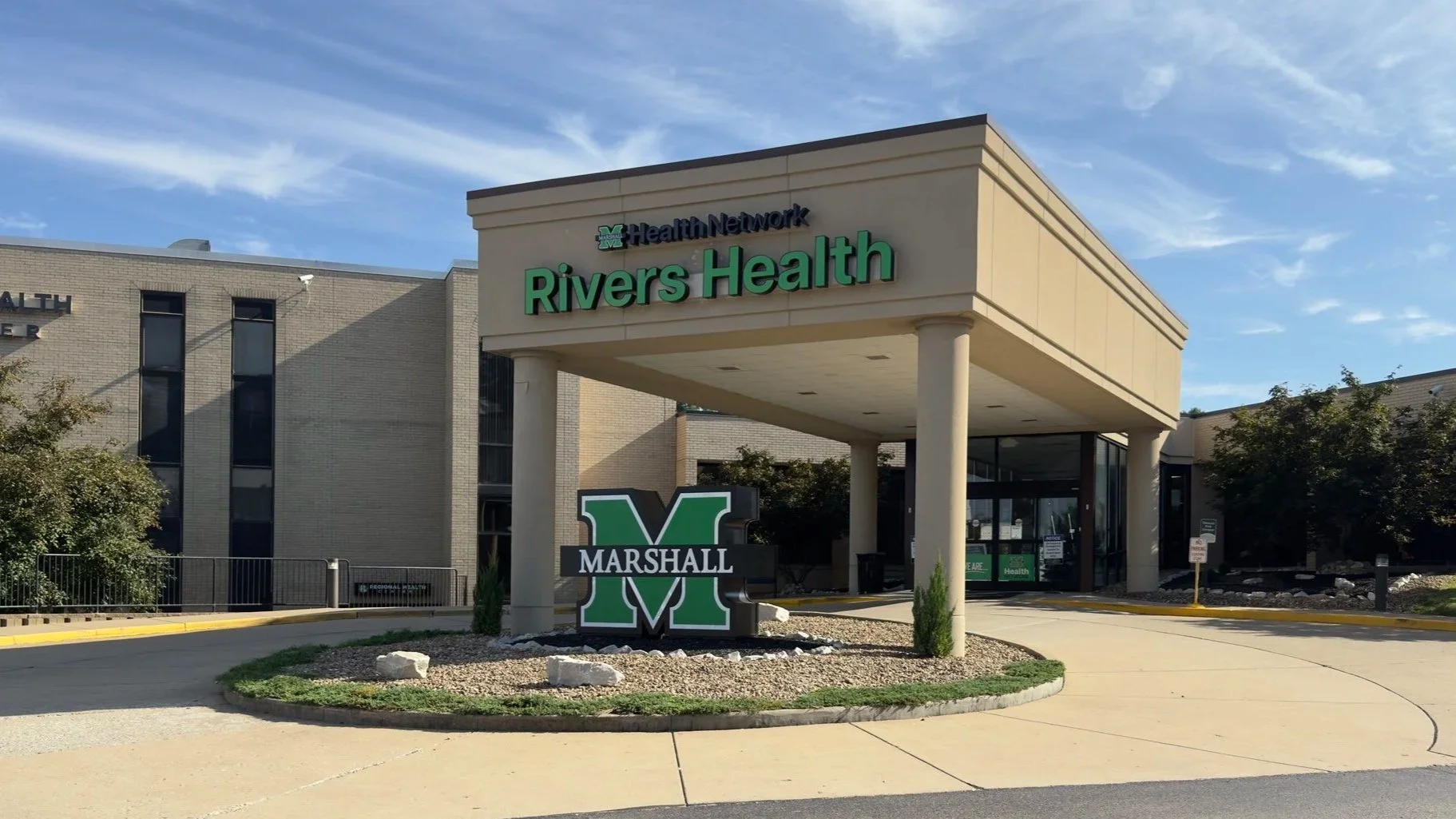 Exterior of Rivers Health medical facility with a sign for Marshall M. Blue, CNP in front.