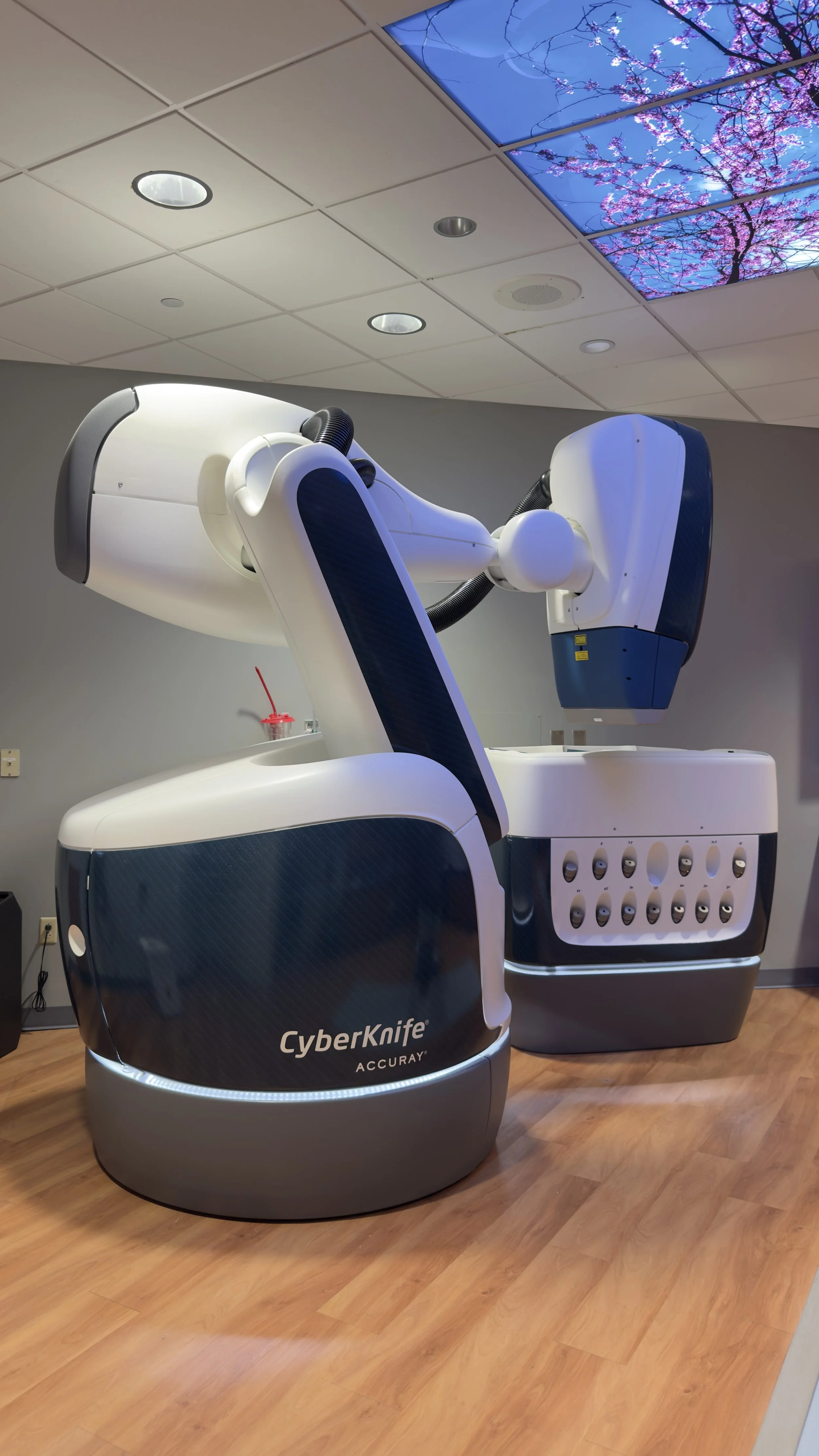 Accuray CyberKnife S7 robotic radiation-treatment equipment inside the completed treatment suite.