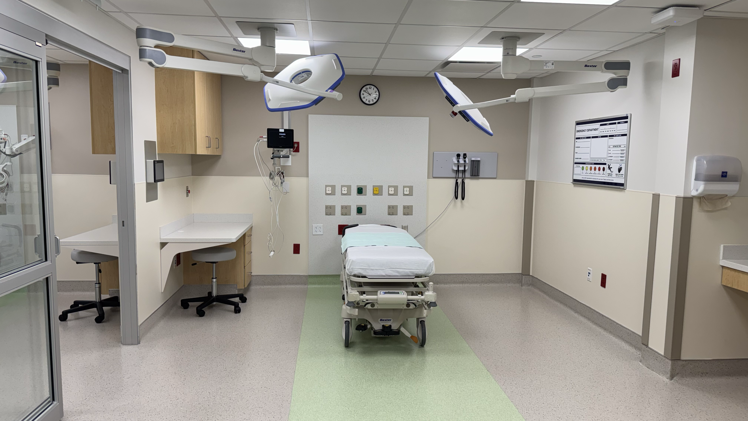 Rivers Health emergency department exam room with stretcher, medical equipment, seating, and clinical finishes in Point Pleasant, West Virginia