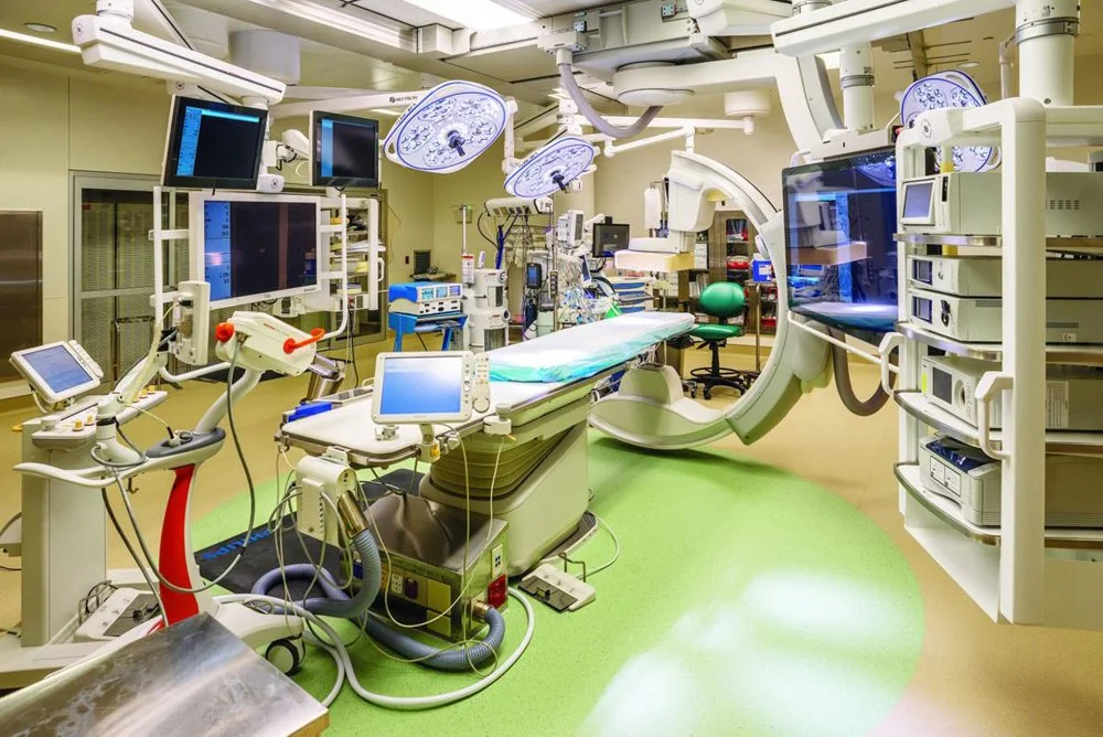 Hybrid operating room at Cabell Huntington Hospital with integrated surgical equipment, monitors, and lighting.