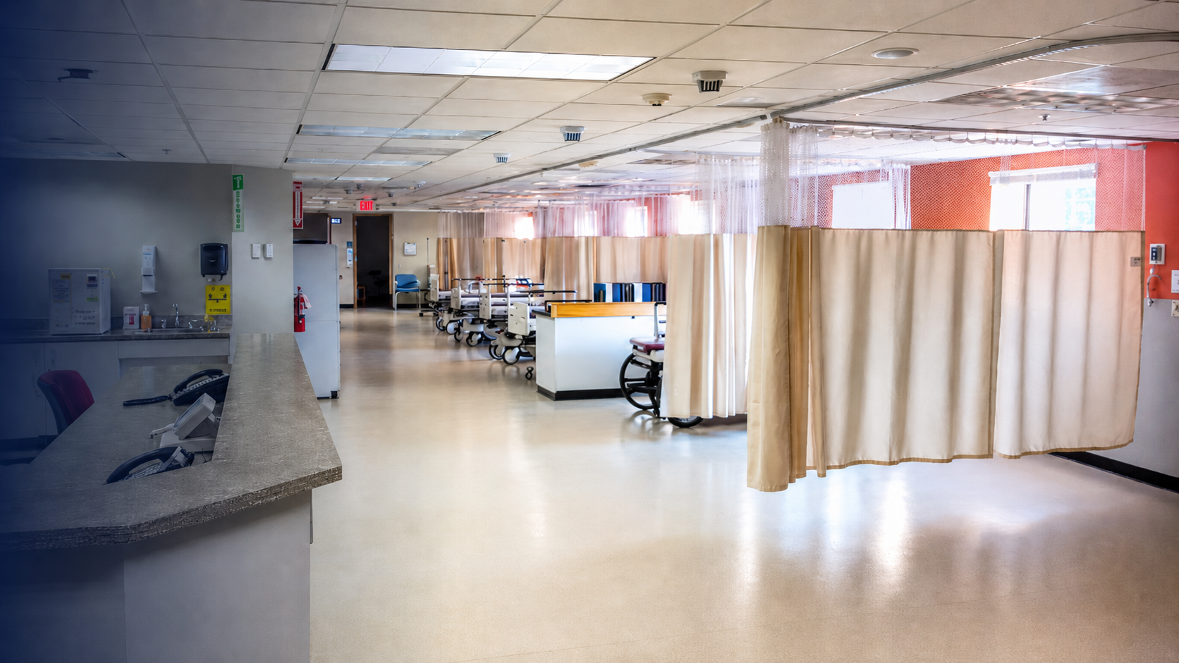 Completed recovery area at the Surgical Eye Center of Morgantown with patient beds, privacy curtains and clinical support space.
