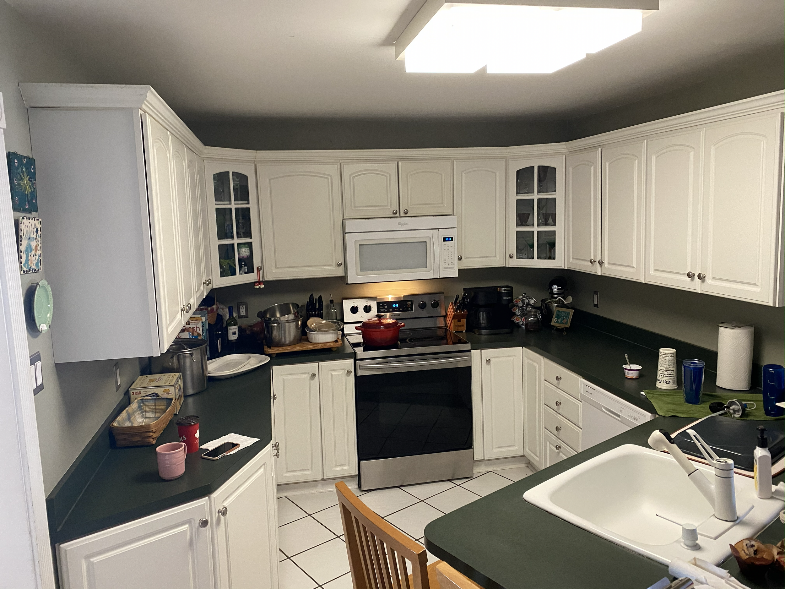 Before : The original cramped and dated kitchen layout.