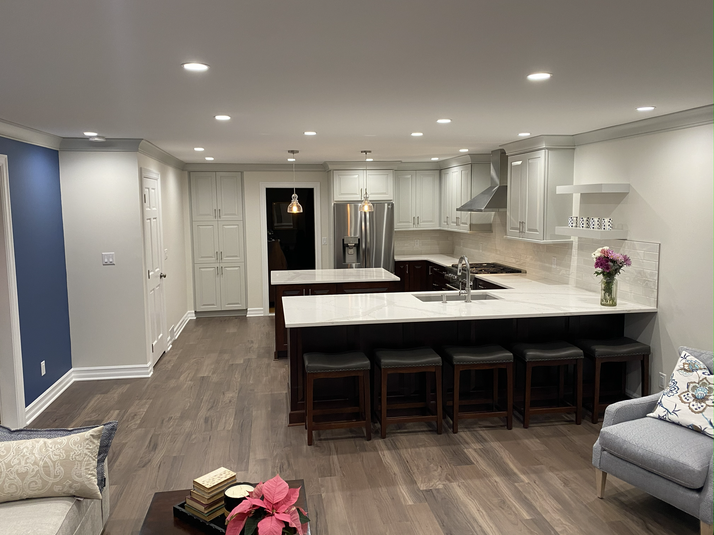 The seamless integration of the kitchen and living areas.png