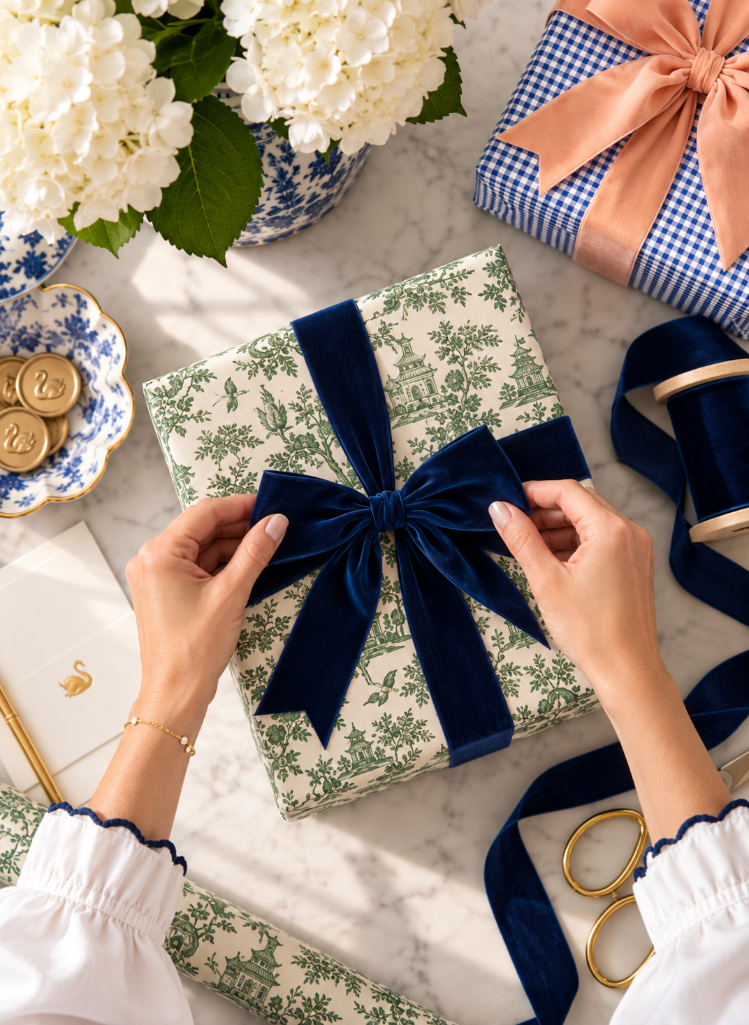Hands tying a velvet bow on a luxury gift