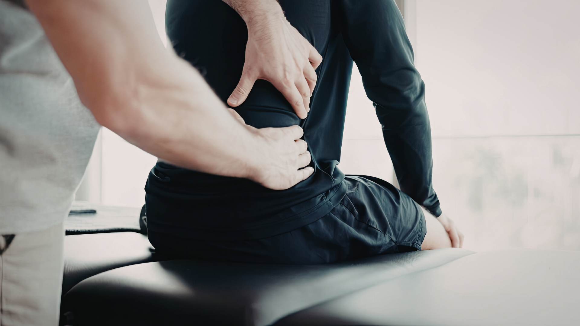 Physician Assisted Stretching to relieve lower back pain in a chiropractic patient.