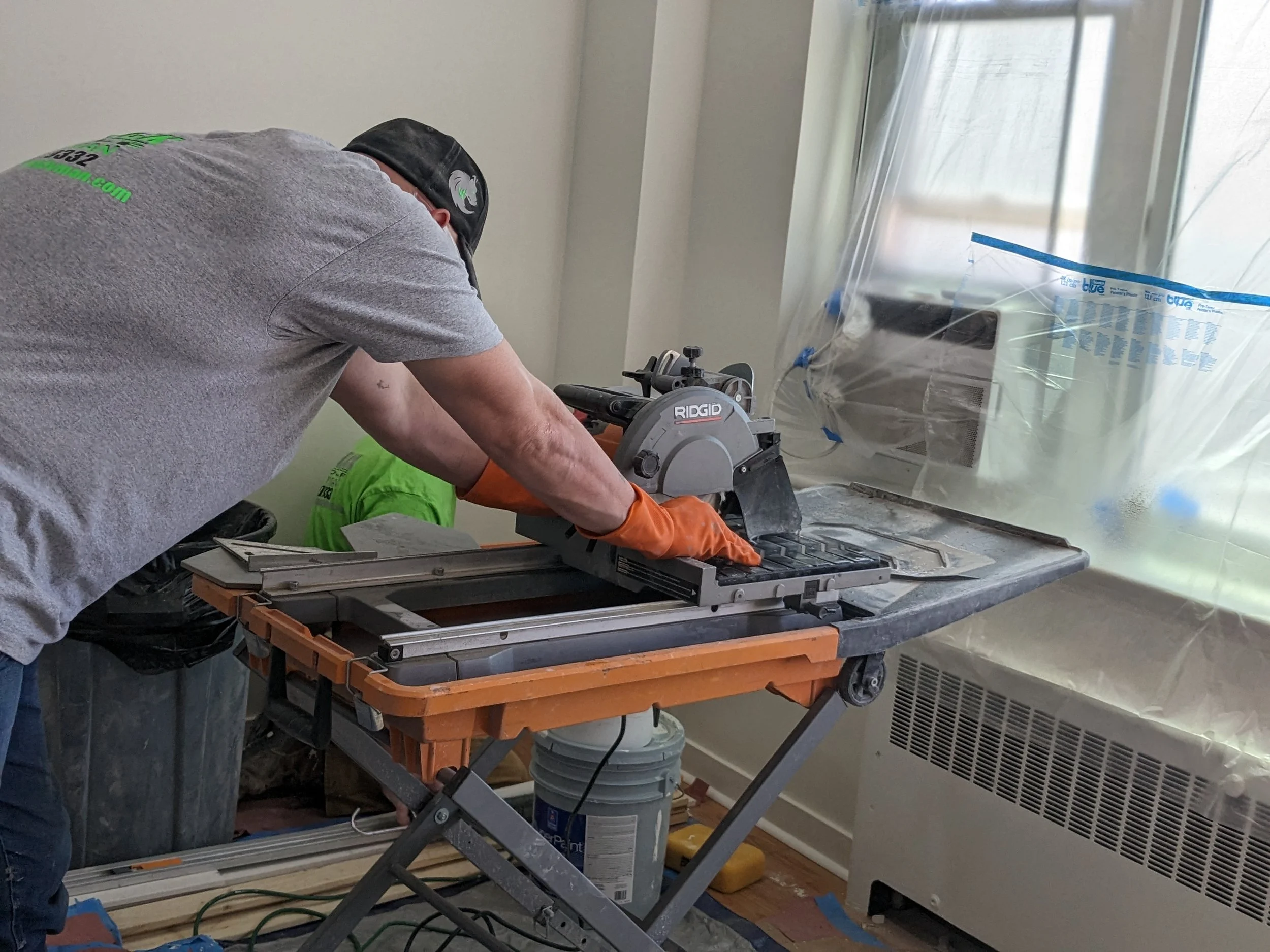 Lone Wolf carpenter using saw