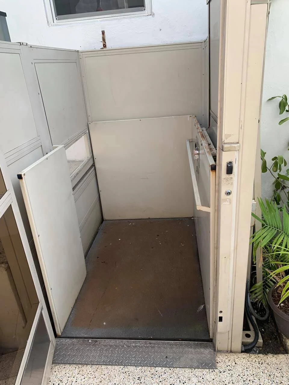 Inside the elevator. Pretty open. Large enough for a power chair