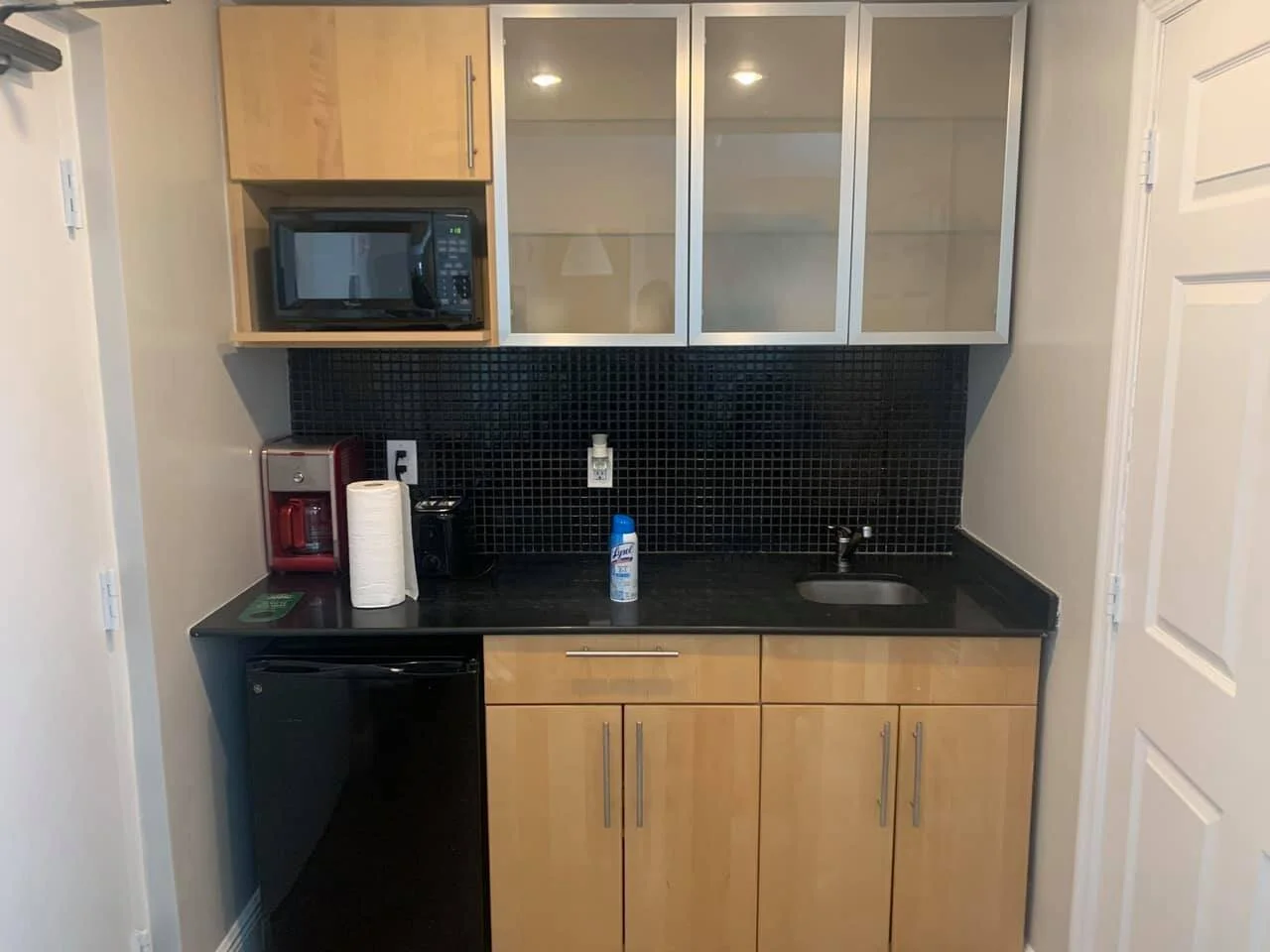 Microwave is too high and sink needs a cut out for wheelchairs to roll under… not very accessible