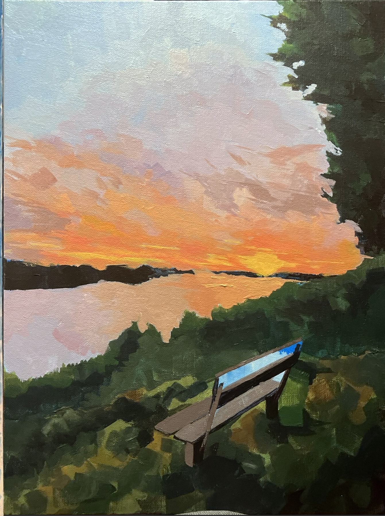 A painting of a sunset over a body of water, with a bench and green foliage in the foreground and dark trees on the right side.