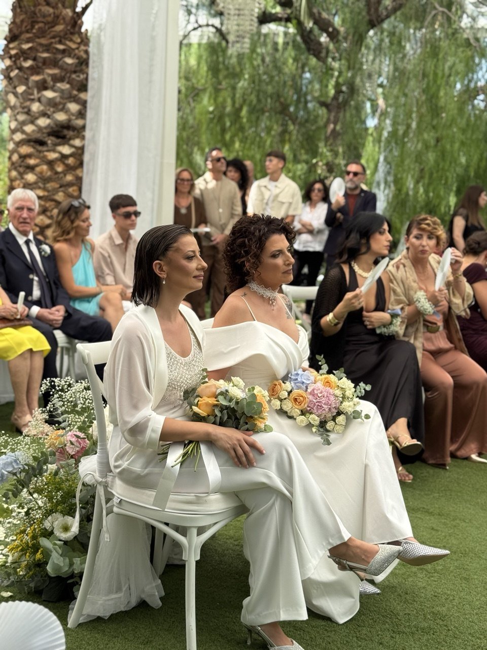 Bride and bridesmaid during a luxury destination wedding in Puglia, Italy at Cristalli di Sale.