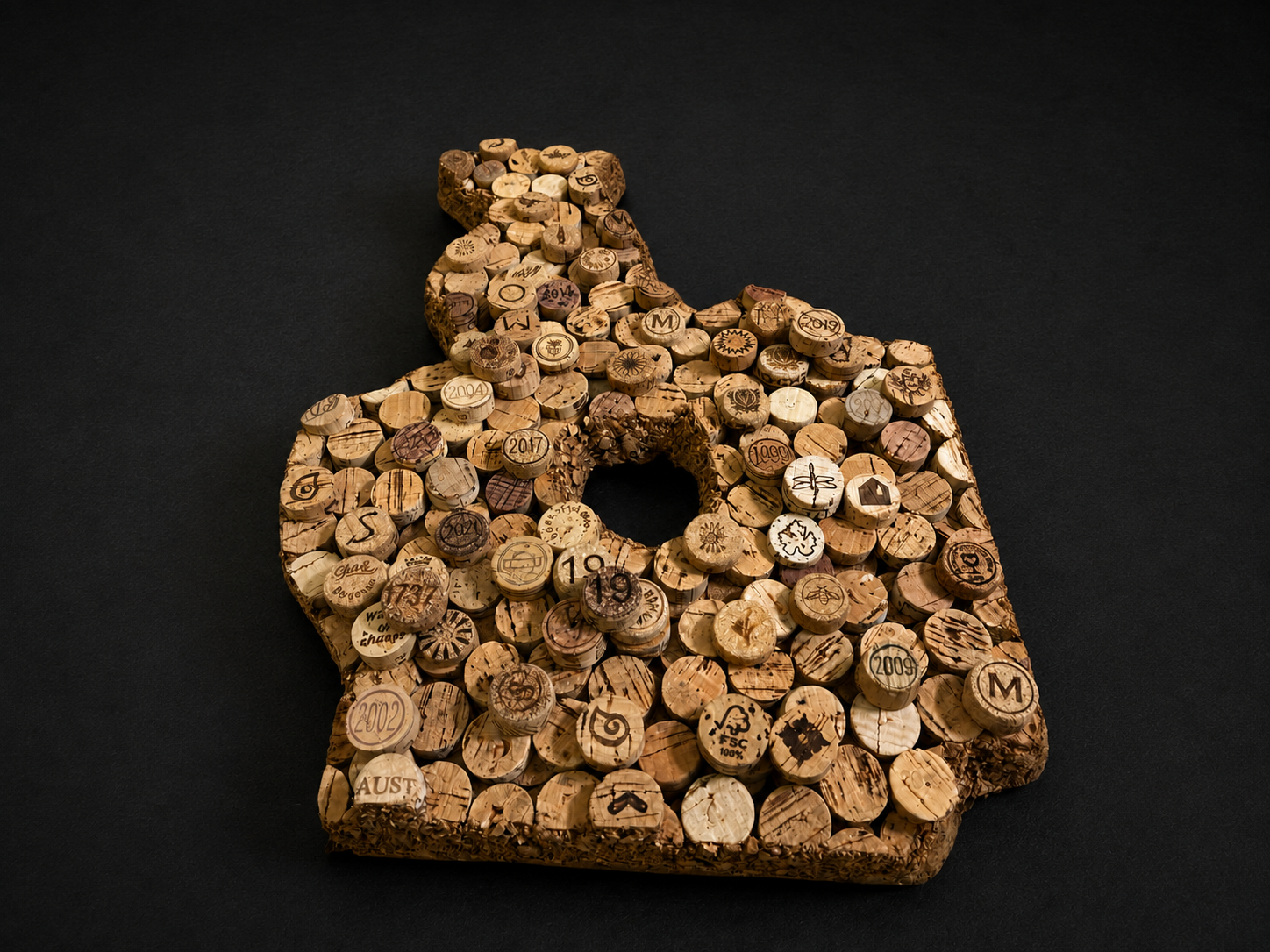 SELECTED WORK

THE ROOT REMAINS

2023–2024

MATERIAL
Turkish olive root wood and approximately 600 hand-cut recycled wine cork discs

DIMENSIONS
37 × 9–29 × 5.5 cm

EDITION / STATUS
Unique work / Available

DESCRIPTION
The Root Remains is built upon 