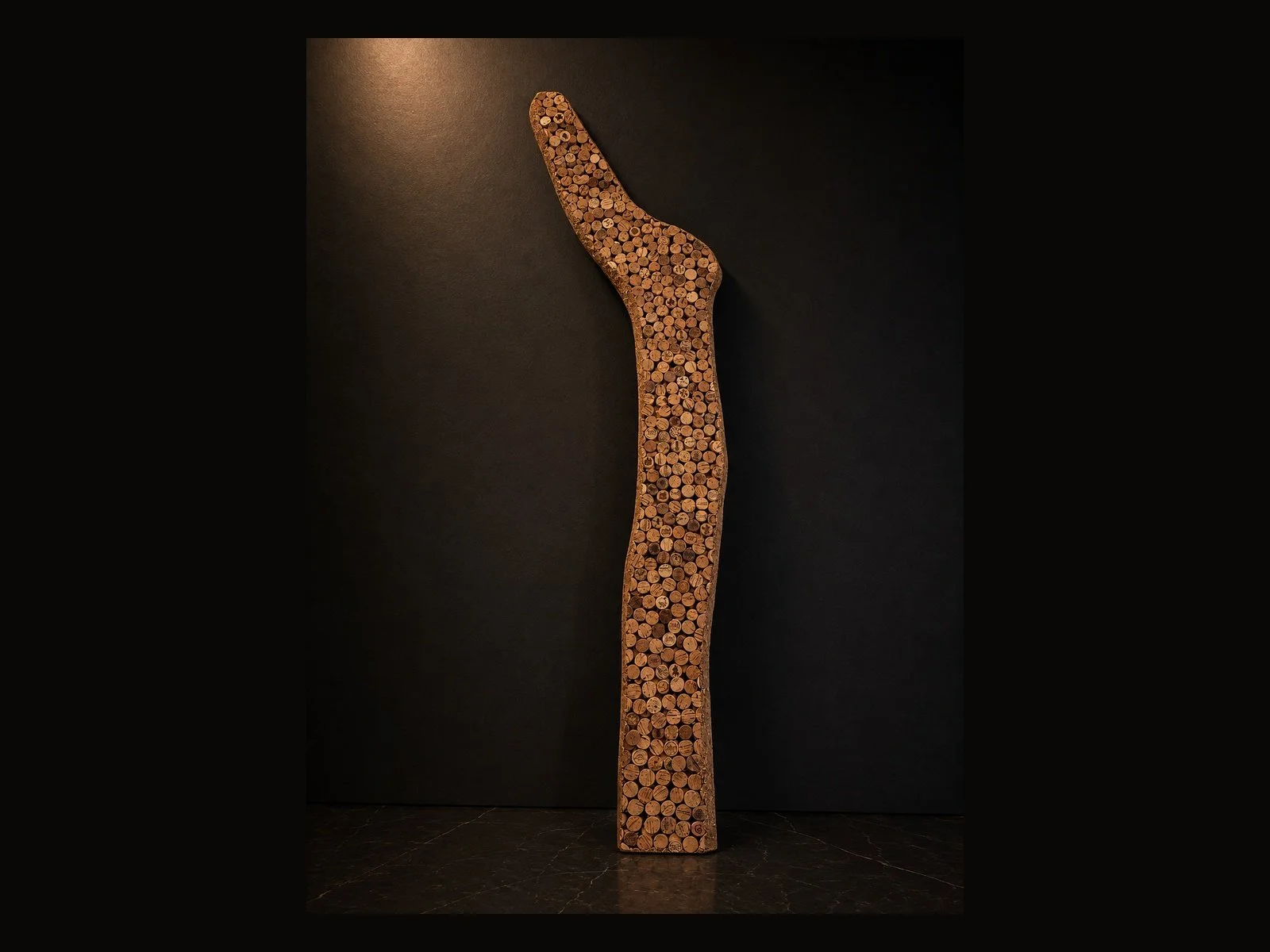 SELECTED WORK

THE PATH OF BEING

2023

MATERIAL
Smoked oak and approximately 1,600 hand-cut recycled wine cork discs

DIMENSIONS
151 × 23 × 7 cm

EDITION / STATUS
Unique work / Available

DESCRIPTION
The Path of Being brings together approximately 1