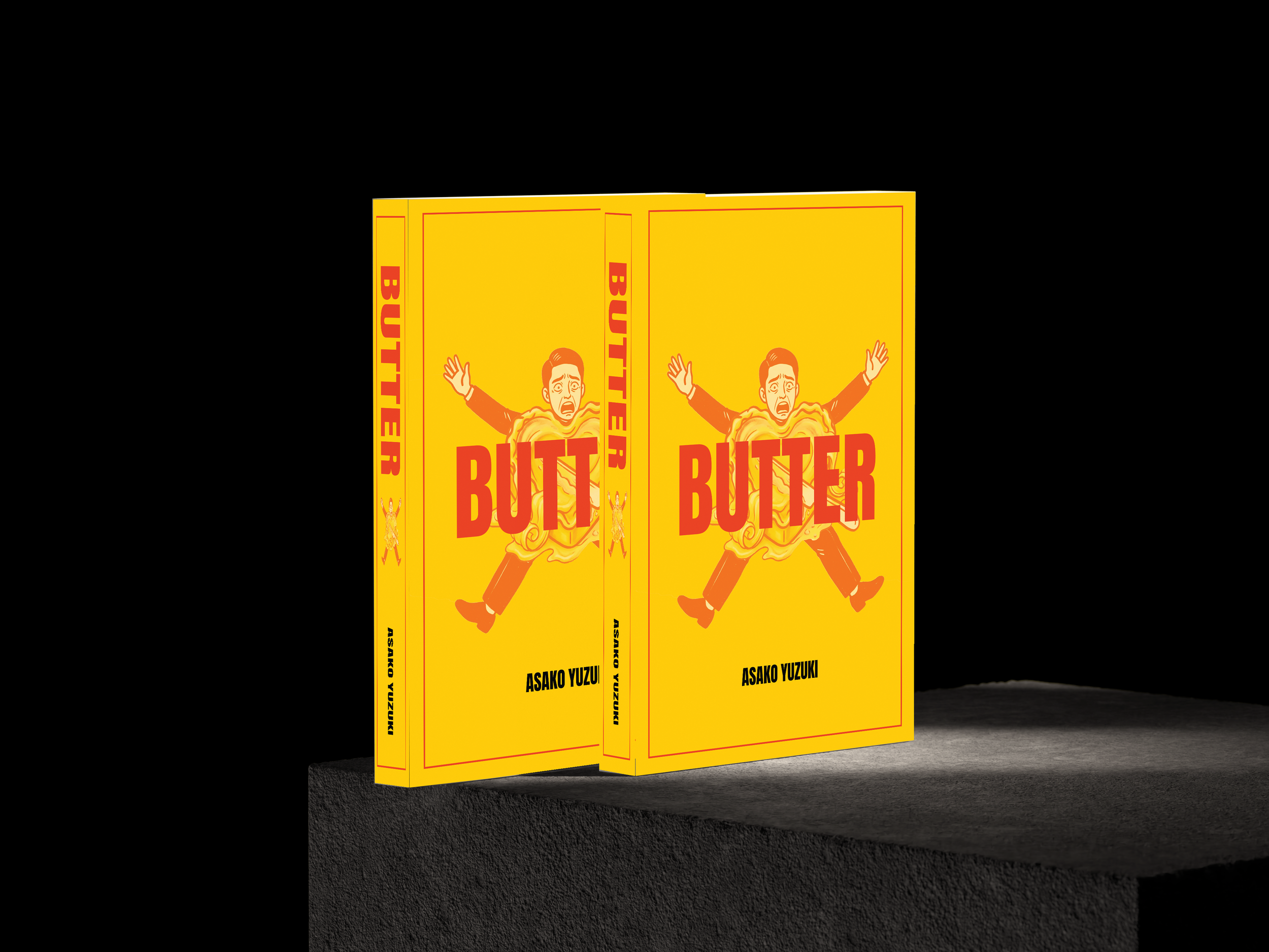 Two copies of a bright yellow book titled "BUTTER" by Asako Yuzuki, featuring a cartoon illustration of a nervous man with his arms raised, on a black background.