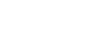 Black and white emblem with 'ROAD TO' at the top and a stylized checkered flag design below