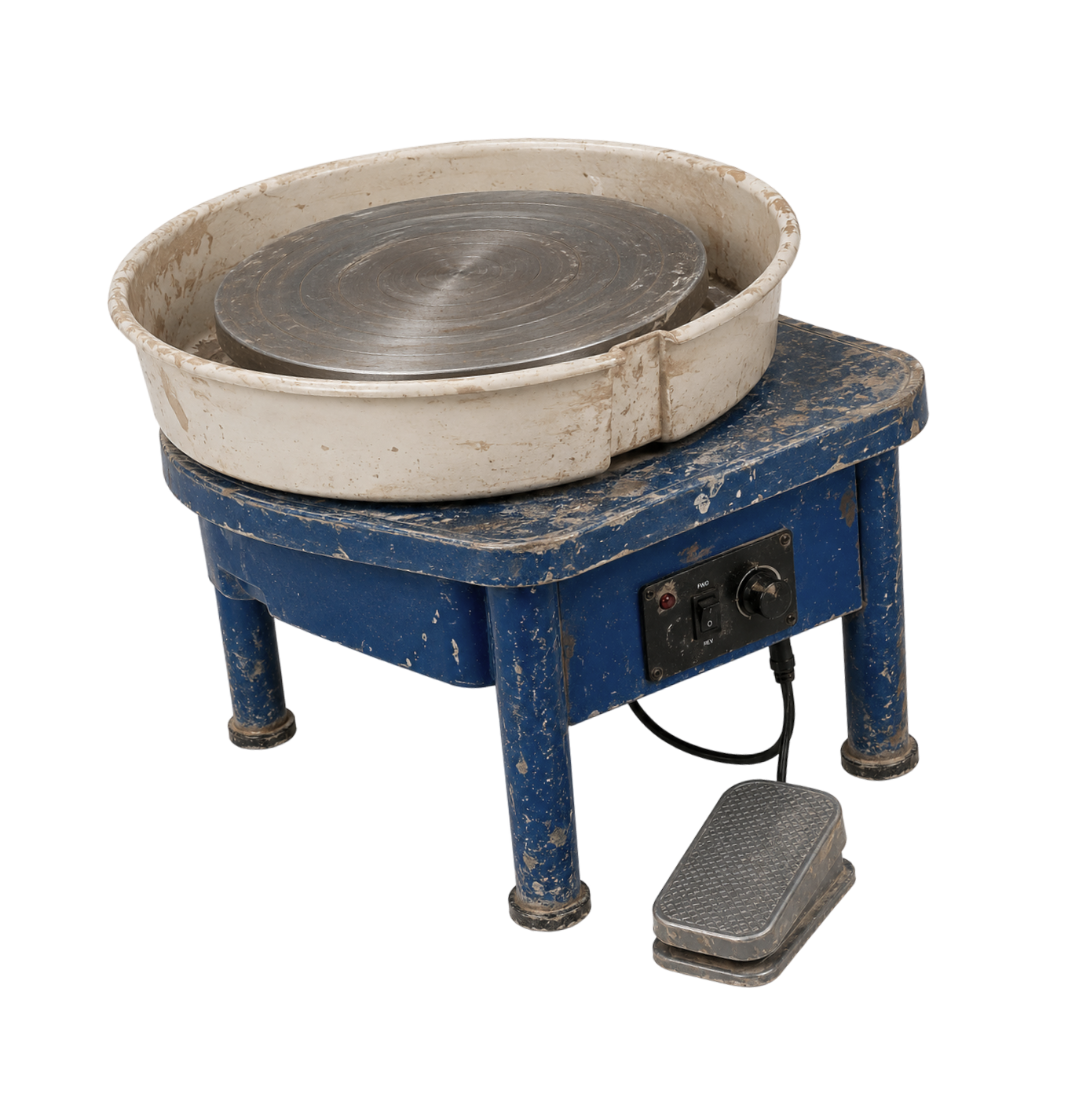 A vintage electric pottery wheel with a metal disc on top, a blue frame with chipped paint, a black control panel, and a textured foot pedal.
