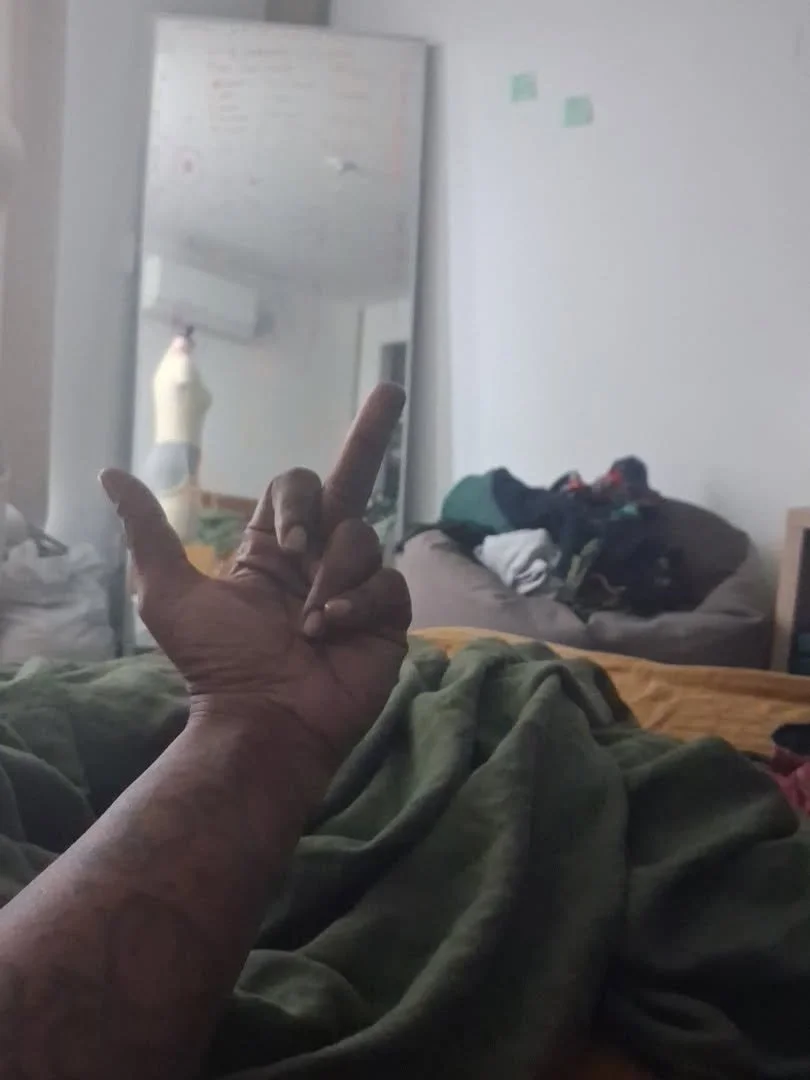 This image was taken after breaking into the creator’s bedroom. She is positioned on the bed. The creator is still unsure how she got her number.