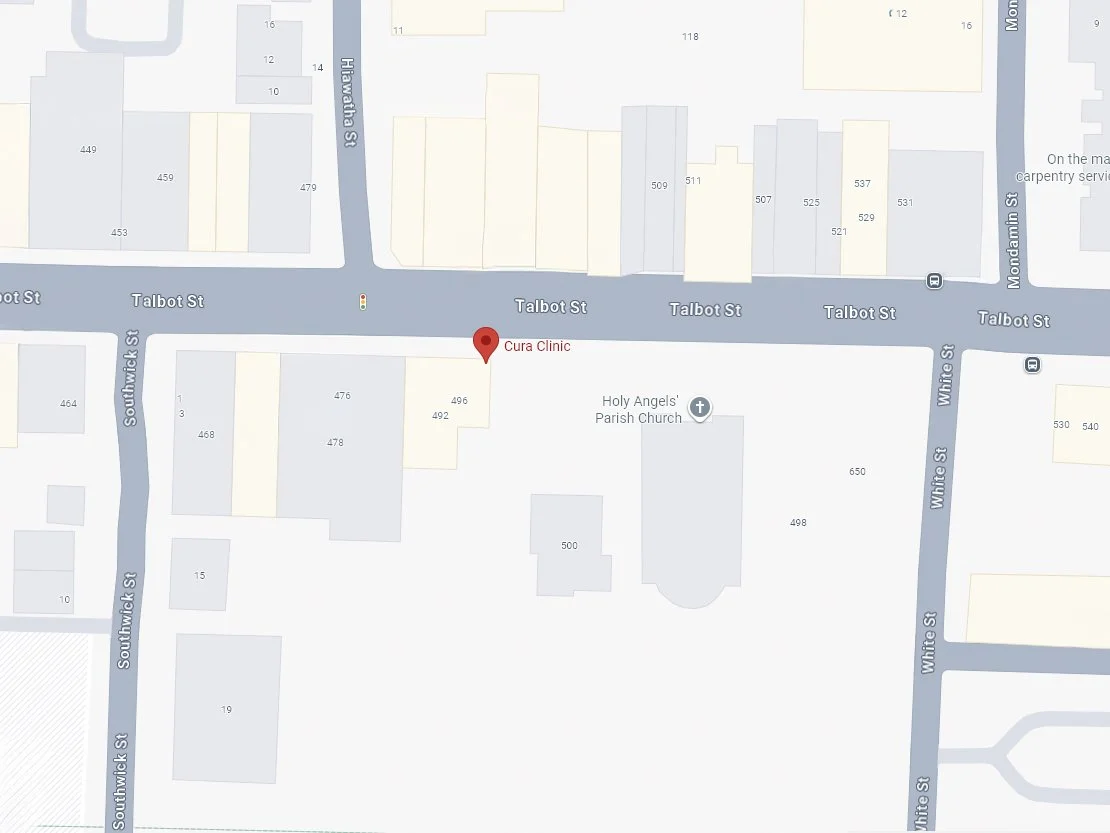 Map showing the intersection of Talbot Street with Southwick Street and White Street, with a marker indicating Cura Clinic near Holy Angels Parish Church. The location of Dr. McManus' chiropractic clinic