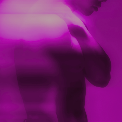 A person taking a mirror selfie with a pink and purple filter, partially showing their upper body and face.