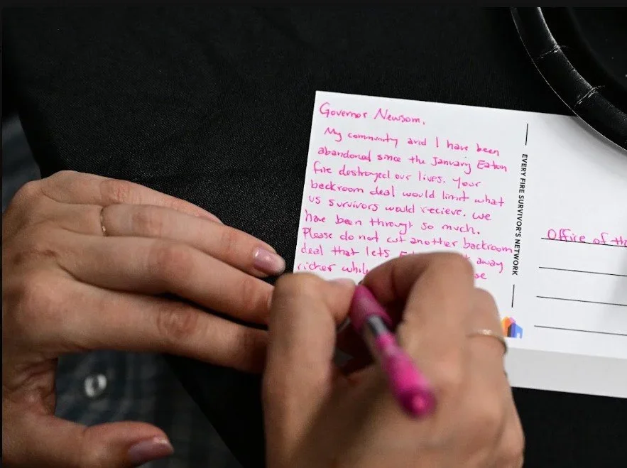 Close-up of a handwritten postcard to Governor Newsom on Every Fire Survivor's Network letterhead, describing hardship after the Eaton Fire and urging him not to cut survivor relief