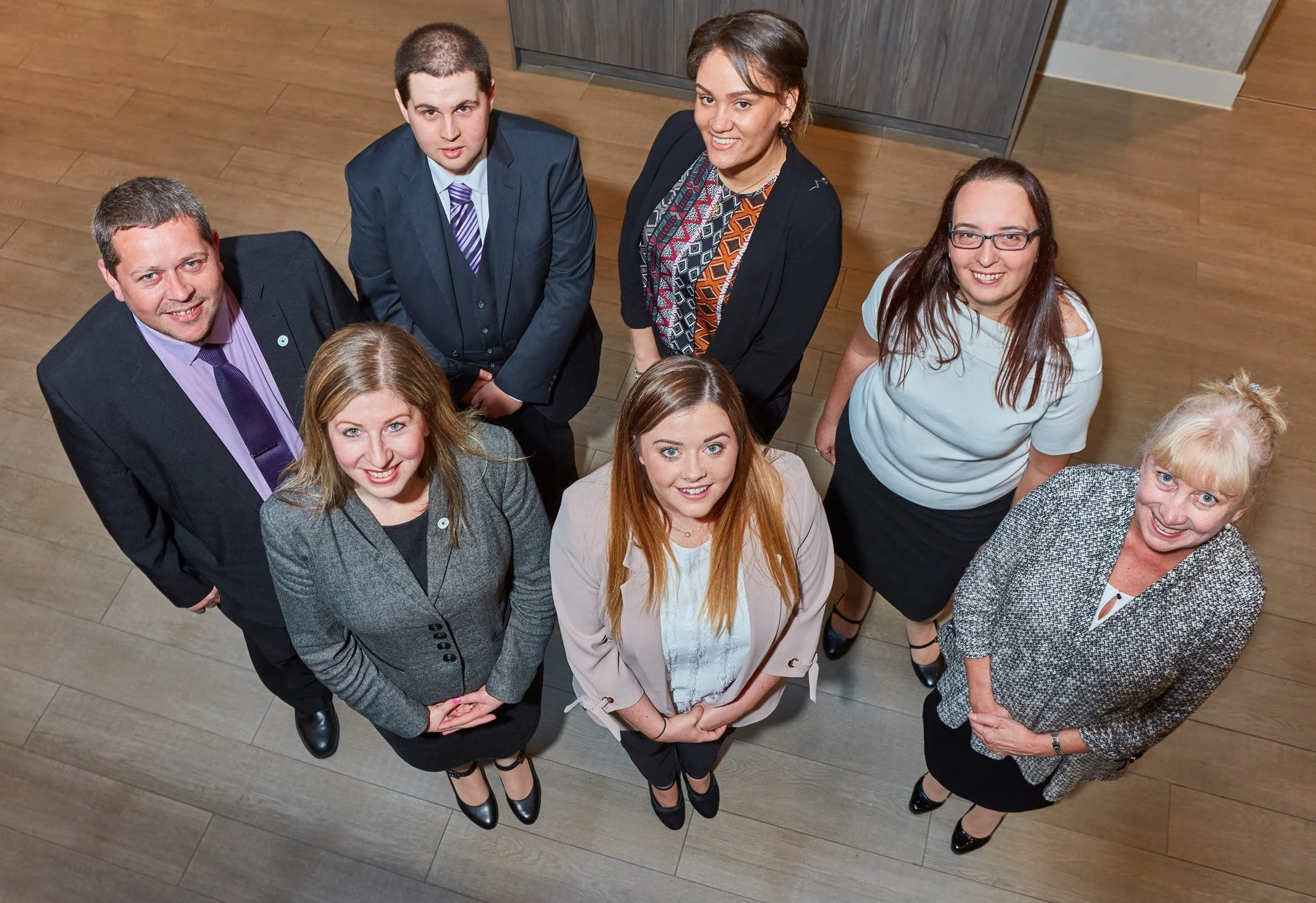 Group shot corporate portrait taken on location at a clients office in Manchester