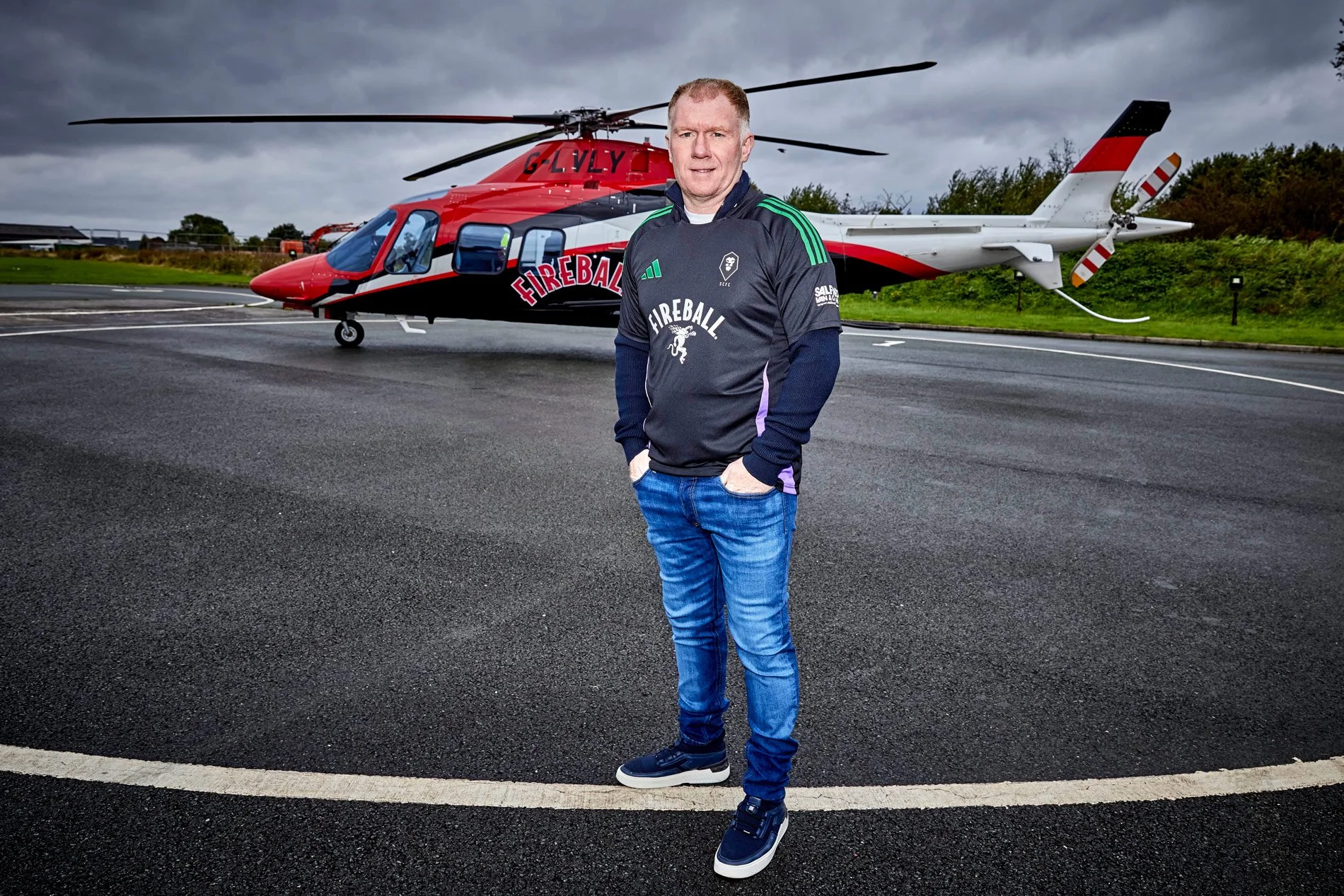 Ex Man Utd footballer Paul Scholes being photographed for a PR stunt for a drinks company by Dave Phillips Photography