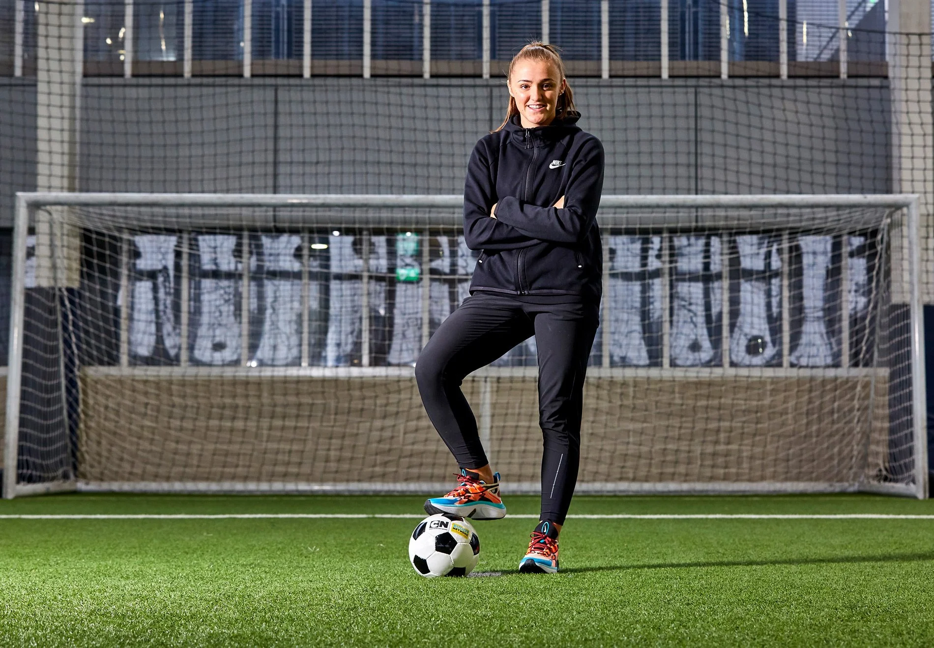 Professional women's footballer shot at Manchester City's training ground by professional editorial photographer Dave Phillips
