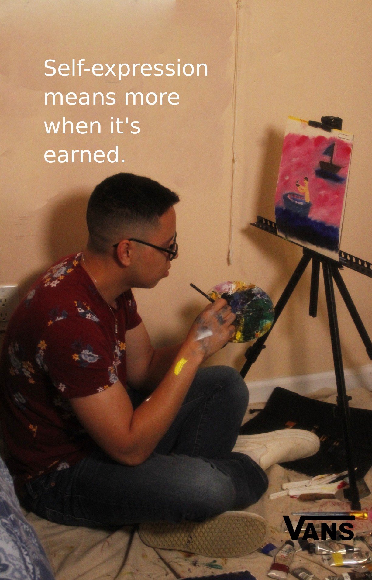 Advertising concept for Vans showing an artist painting at an easel. Headline reads: "Self-expression means more when it's earned.