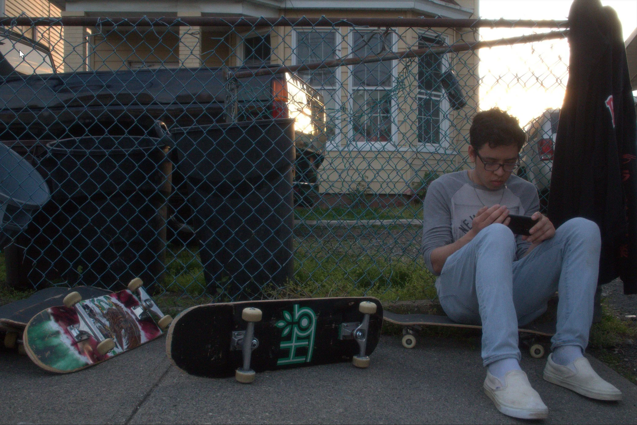Reference photograph for a Vans advertising campaign featuring a skateboarder between sessions at a local skate park.