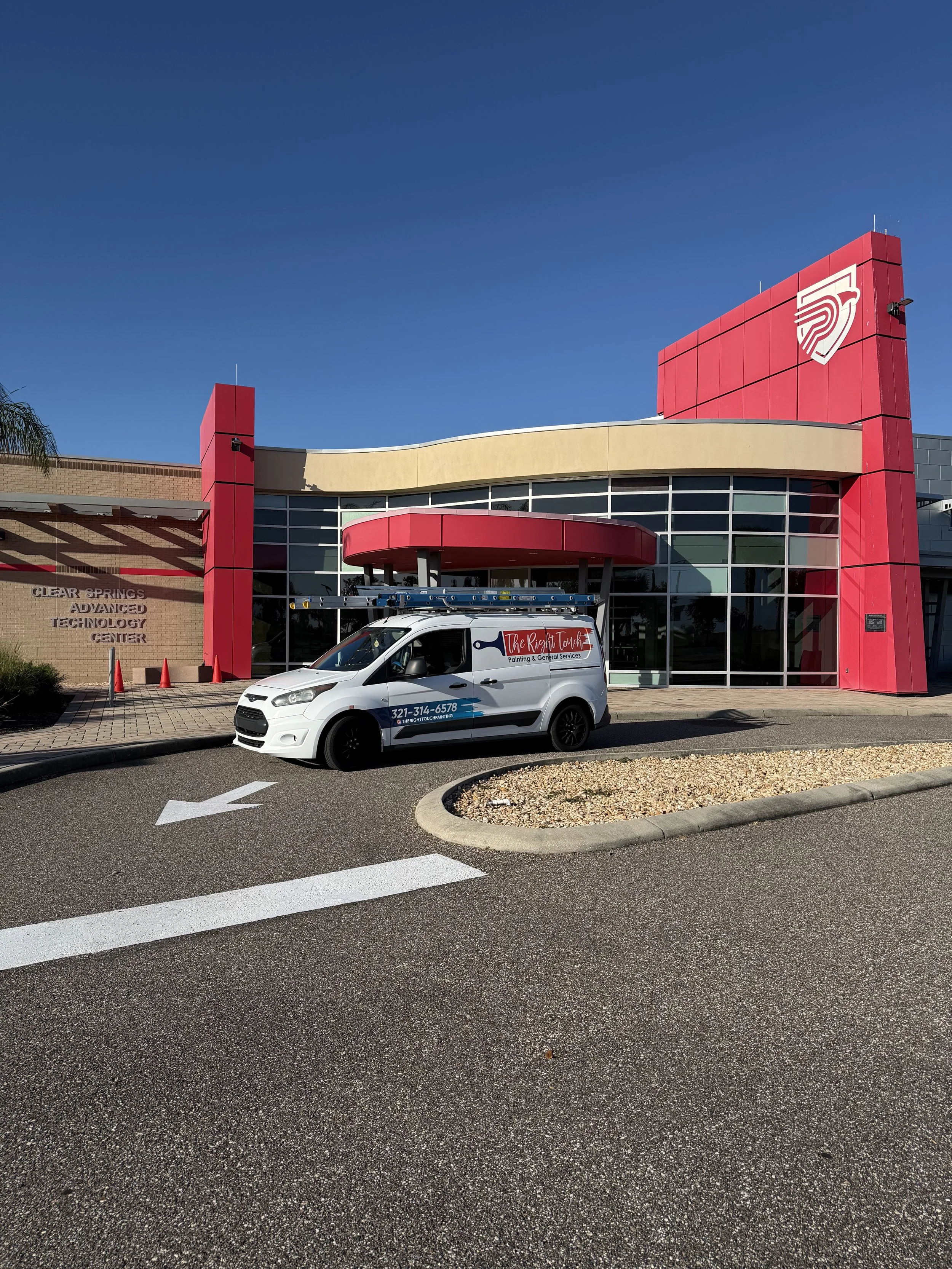 Exterior commercial painting project at Clear Springs Advanced Technology Center completed by The Right Touch Painting in Central Florida.